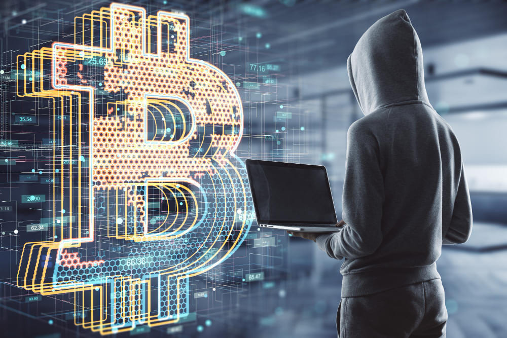Hacker tentant de voler des bitcoins